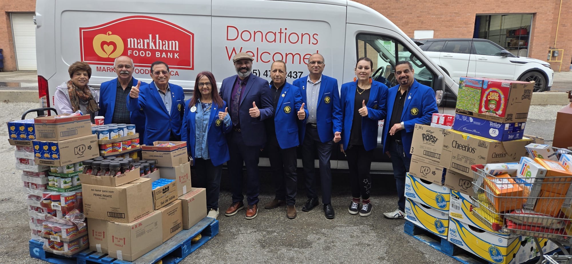 Markham Mantra Lions Club members organizing food donation drive.